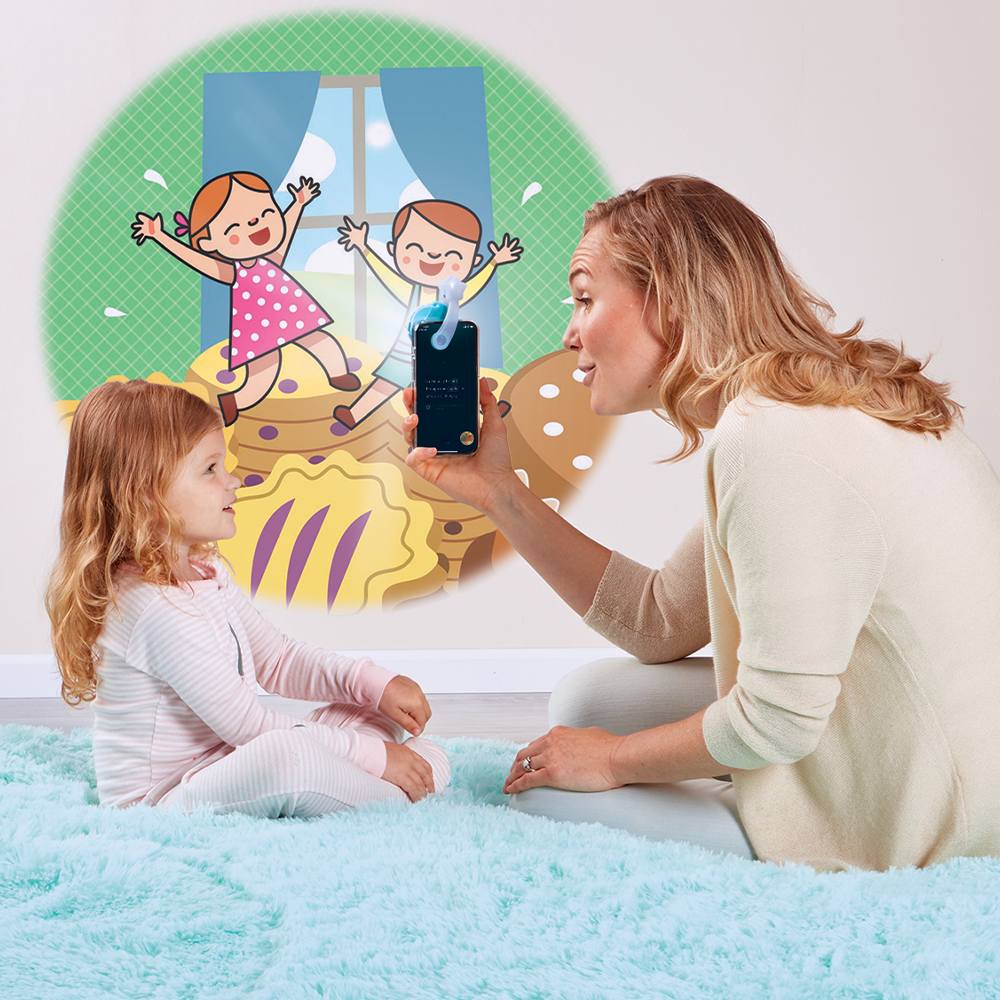 Mother reading to daughter with the Moonlite Storytime Projector