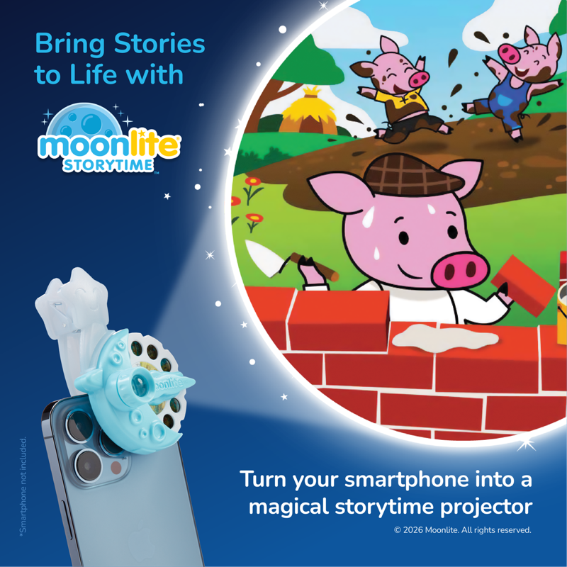 Moonlite Storytime phone projector attachment shown attached to a smartphone, with a large circular screen preview displaying a three little  pigs story scene. Text reads 'Bring Stories to Life with Moonlite Storytime' and 'Turn your smartphone into a magical storytime projector.