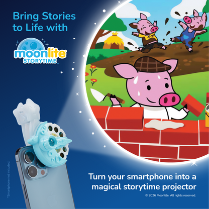 Moonlite Storytime phone projector attachment shown attached to a smartphone, with a large circular screen preview displaying a three little  pigs story scene. Text reads 'Bring Stories to Life with Moonlite Storytime' and 'Turn your smartphone into a magical storytime projector.